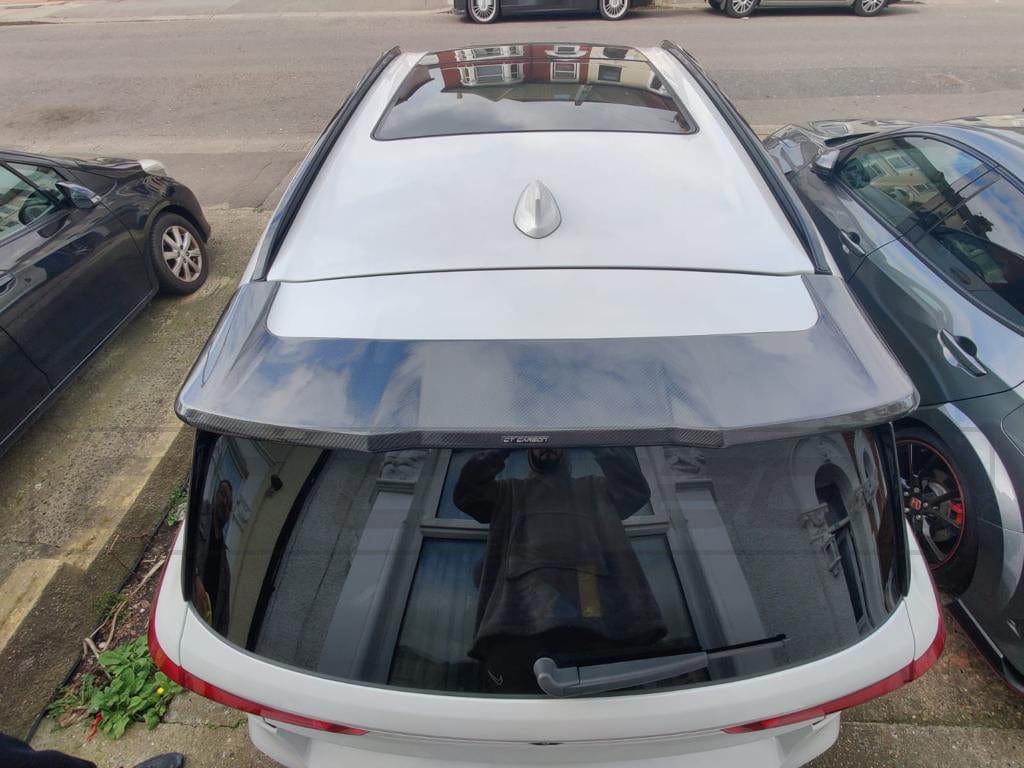 BMW X5 G05 carbon fibre spoiler by CT Carbon, showcasing the sleek, aerodynamic design on the vehicle's rear.