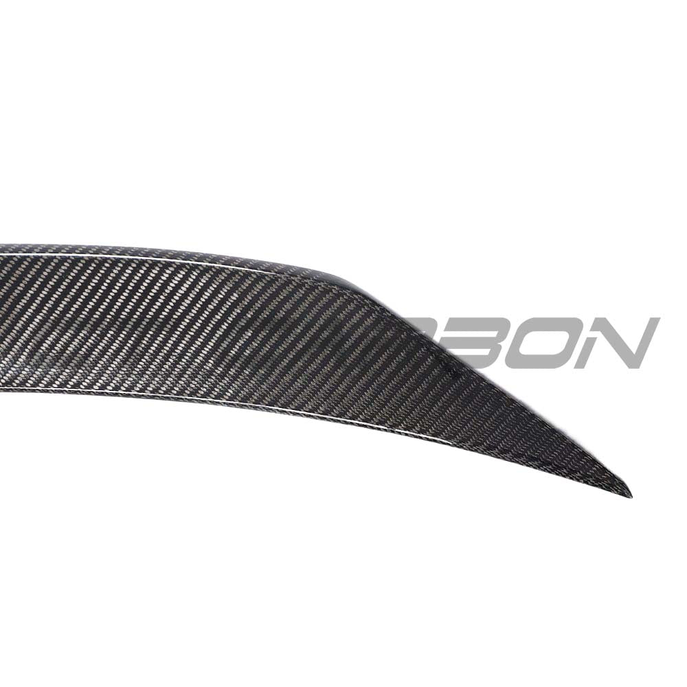 Mercedes C-Class and C43 W205 coupe carbon fibre kit by CT Carbon, featuring a sleek carbon fibre spoiler on the vehicle.
