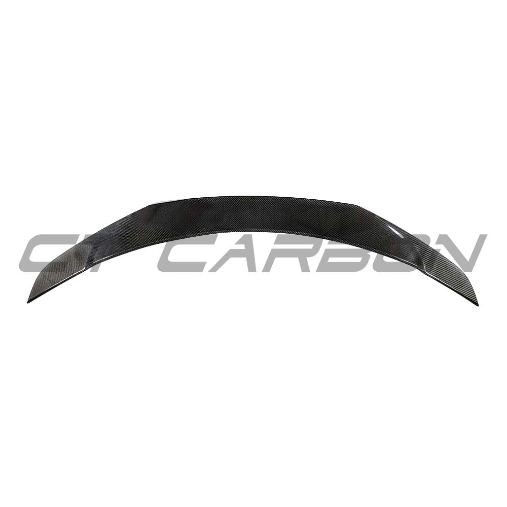 Tesla Model 3 2017-2023 CT Carbon V-style carbon fiber spoiler installed on the rear of the car, showcasing sleek aerodynamic design.