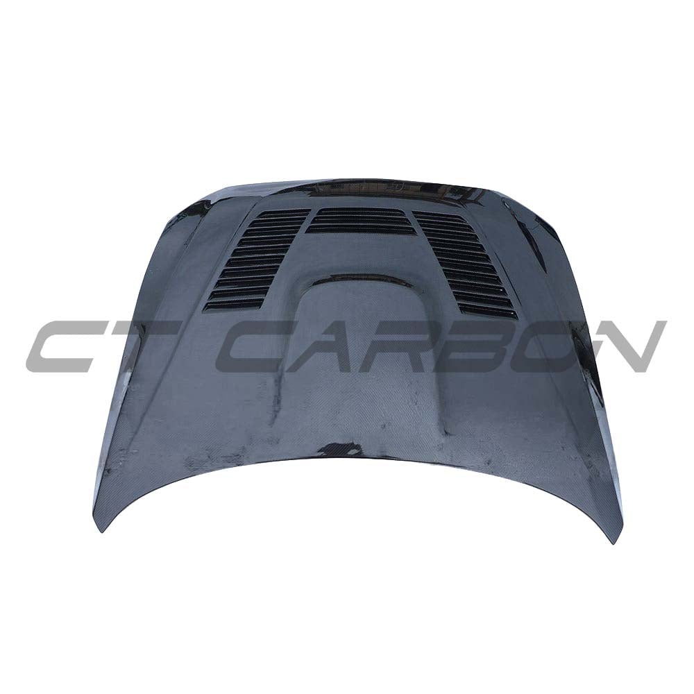 BMW M2 and 1 Series CT Carbon fibre bonnet, sleek lightweight car hood with visible carbon fiber weave, designed for performance.