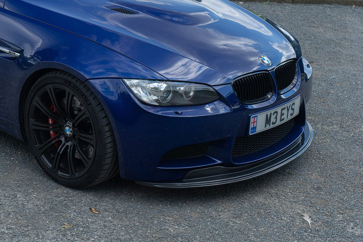BMW M3 E92/E90 carbon fibre splitter by CT Carbon, GTS style, showcasing the sleek, lightweight aerodynamic car part.