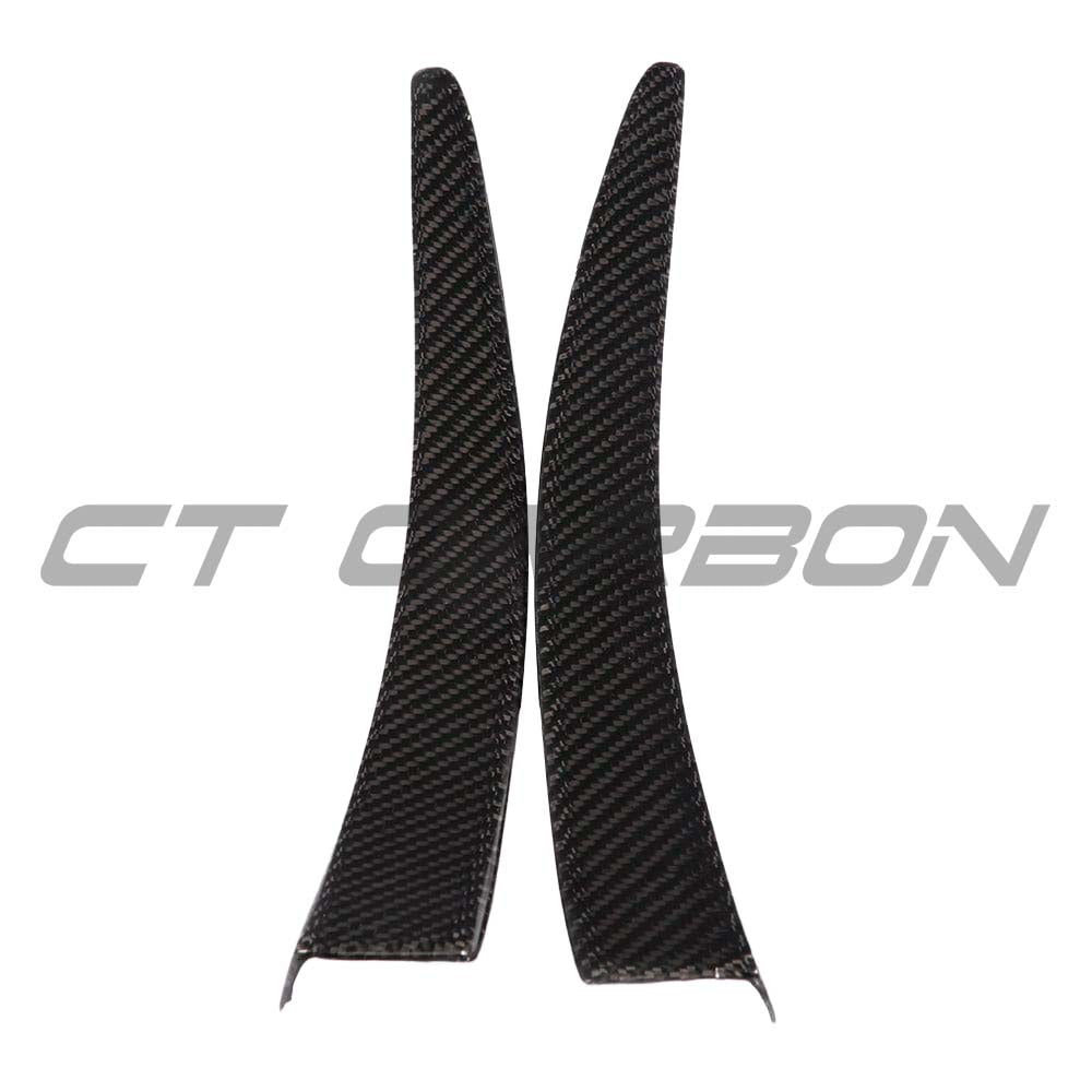 BMW M3 M4 F80 F82 F83 carbon fibre canard fins by CT Carbon, close-up of aerodynamic car accessories on vehicle.