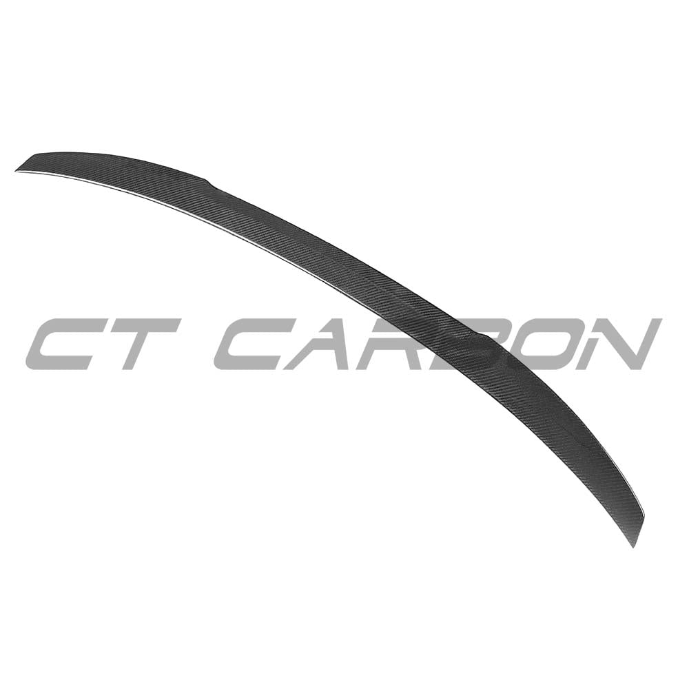 BMW M5 F90 and G30 5 Series carbon fiber spoiler by CT Carbon, M4 style, shown installed on the vehicle.