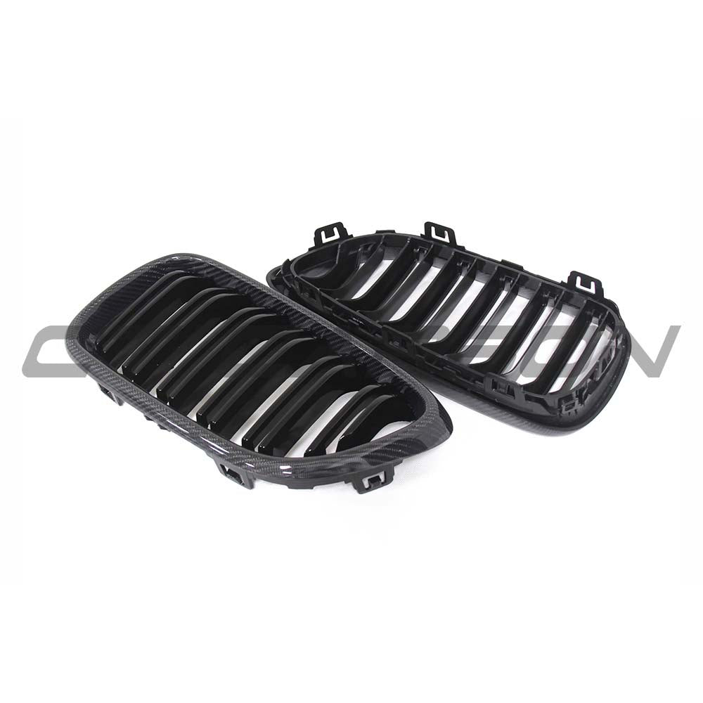 BMW F87 M2 Carbon Fibre Grill Kit by CT Carbon, featuring sleek, lightweight carbon fibre grille components on a sports car.