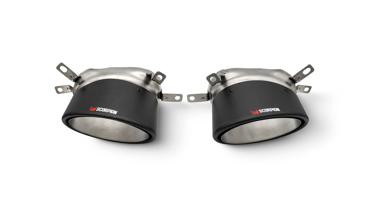 Pair of Scorpion Audi RS6 C7 Avant carbon fiber tailpipe trim by Scorpion Exhausts, featuring sleek Ascari RS design.