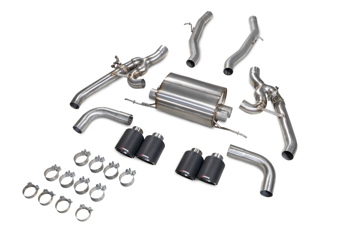 Scorpion BMW X4 M half exhaust system with valves, showing polished metal pipes and exhaust tips on a black vehicle.