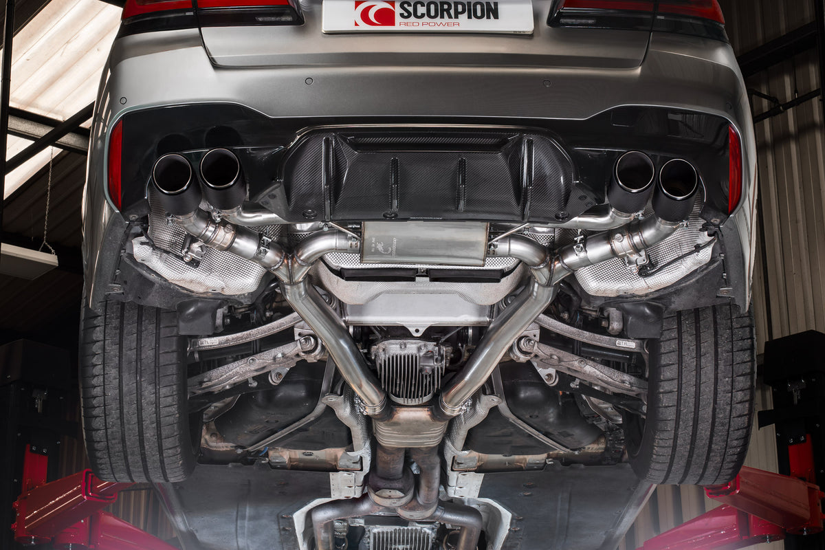 Scorpion BMW F90 M5 Half Exhaust System with electronic valves, showing polished metal pipes and muffler components.