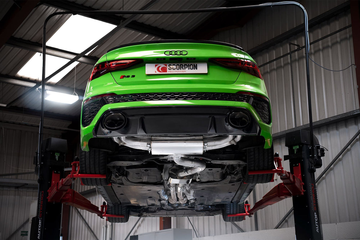 Scorpion Exhausts GPF-back exhaust system with valves installed on a silver Audi RS3 8Y saloon, showing polished metal pipes and mufflers.