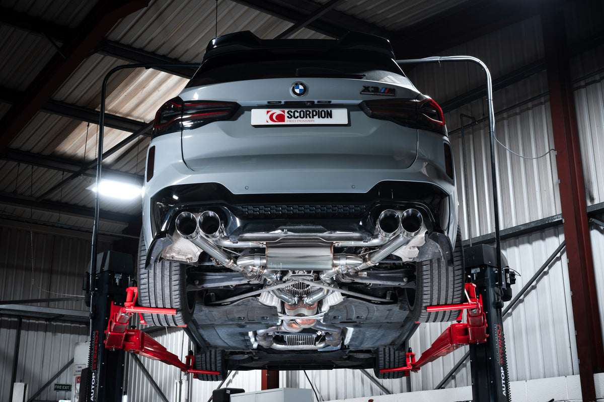 Scorpion BMW X3 M G01 LCI and X4 M G02 Competition half exhaust system with valves, showcasing polished metal pipes and dual tips.