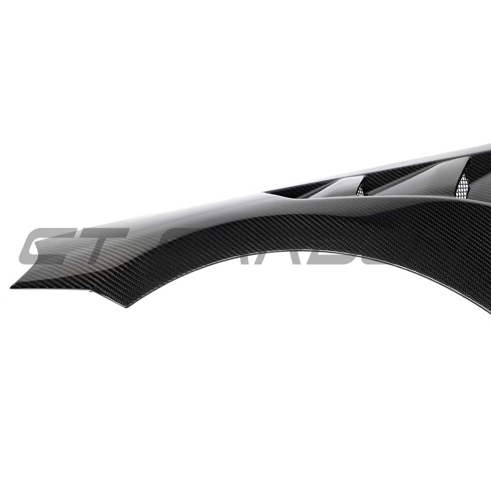 BMW G87 M2 CT Carbon full car carbon fibre conversion kit installed on vehicle, showcasing sleek, lightweight carbon fibre components.