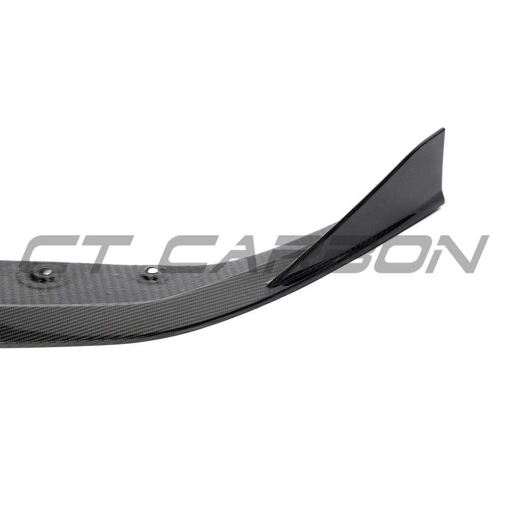 CT Carbon Lamborghini Revueltó carbon fiber front splitter, lightweight aerodynamic car accessory with sleek, textured finish.