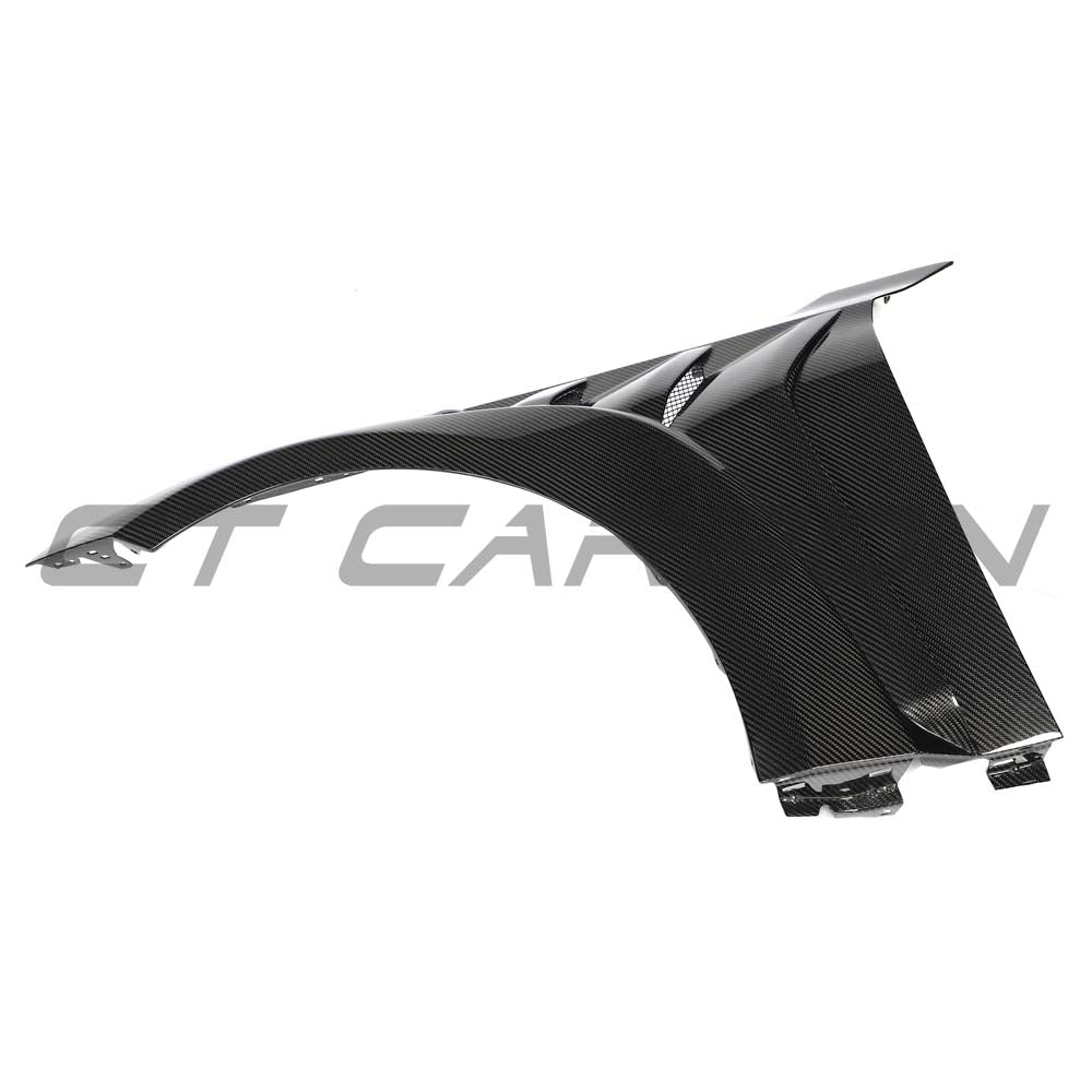 BMW G87 M2 CT Carbon full carbon fibre front end kit, including bumper and splitter, installed on the car, showcasing sleek design.