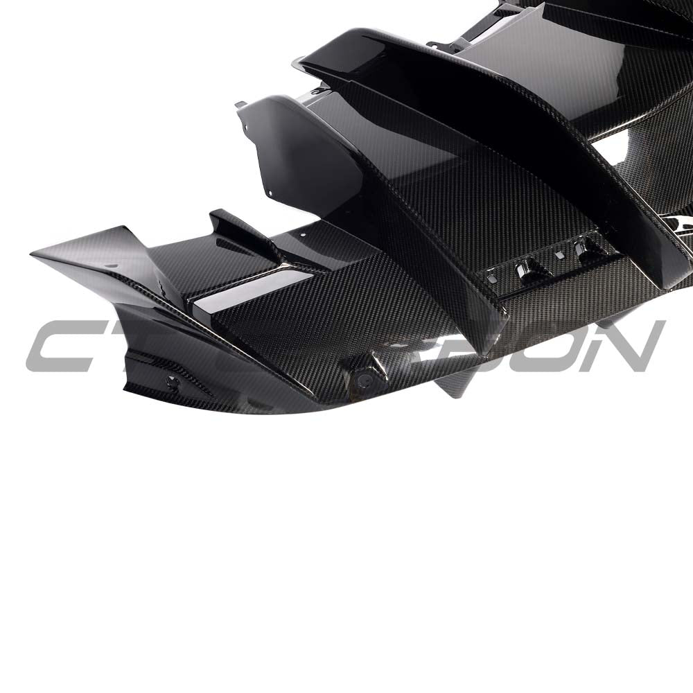 Carbon fiber Lamborghini Revueltto rear diffuser by CT Carbon, showcasing sleek aerodynamic design and textured surface.