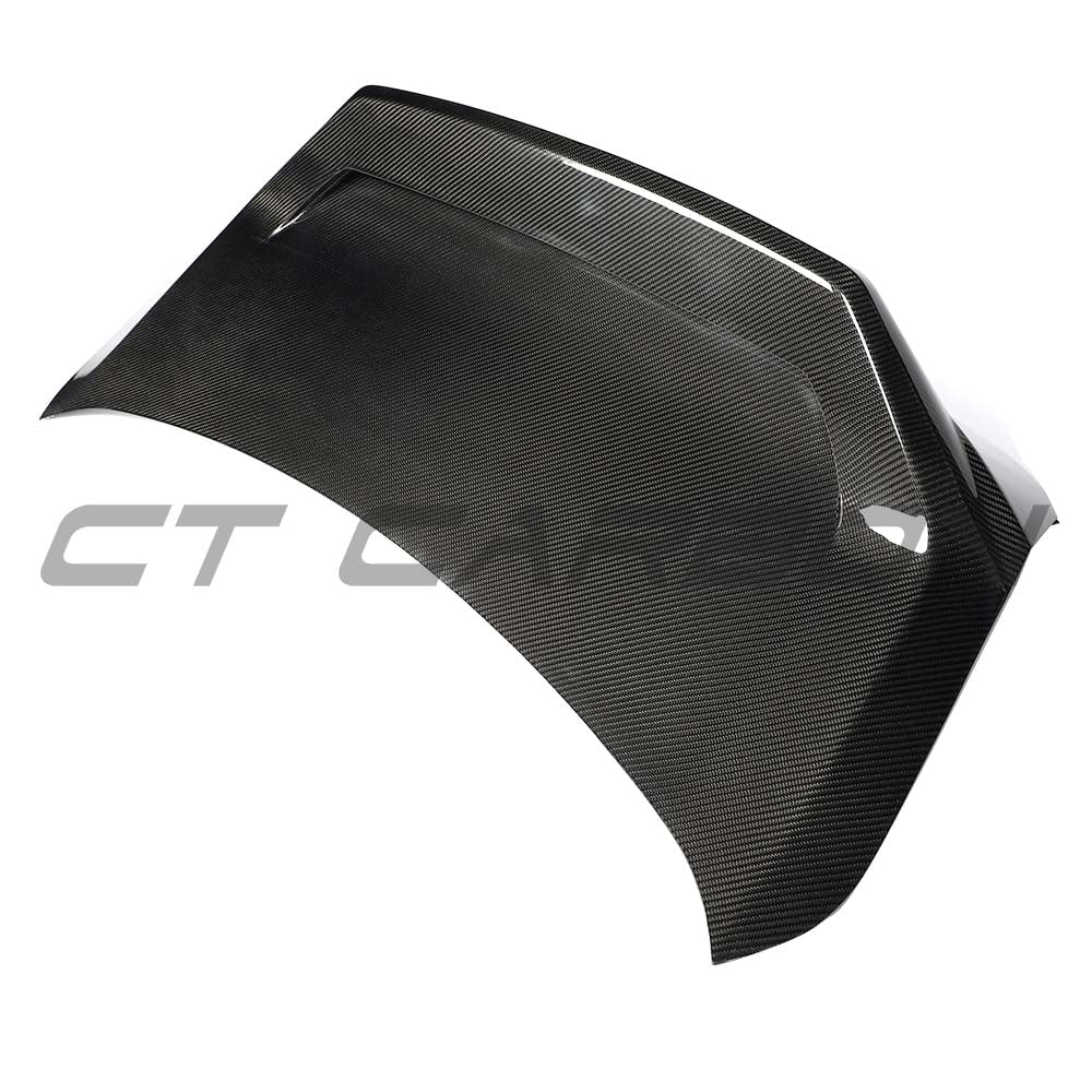 BMW G87 M2 CT Carbon full car carbon fiber conversion kit with detailed panels and components displayed on the vehicle.