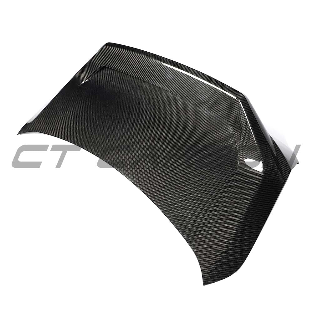 BMW G87 M2 CT Design full car carbon fiber kit showing sleek, aerodynamic carbon fiber components on the vehicle exterior.