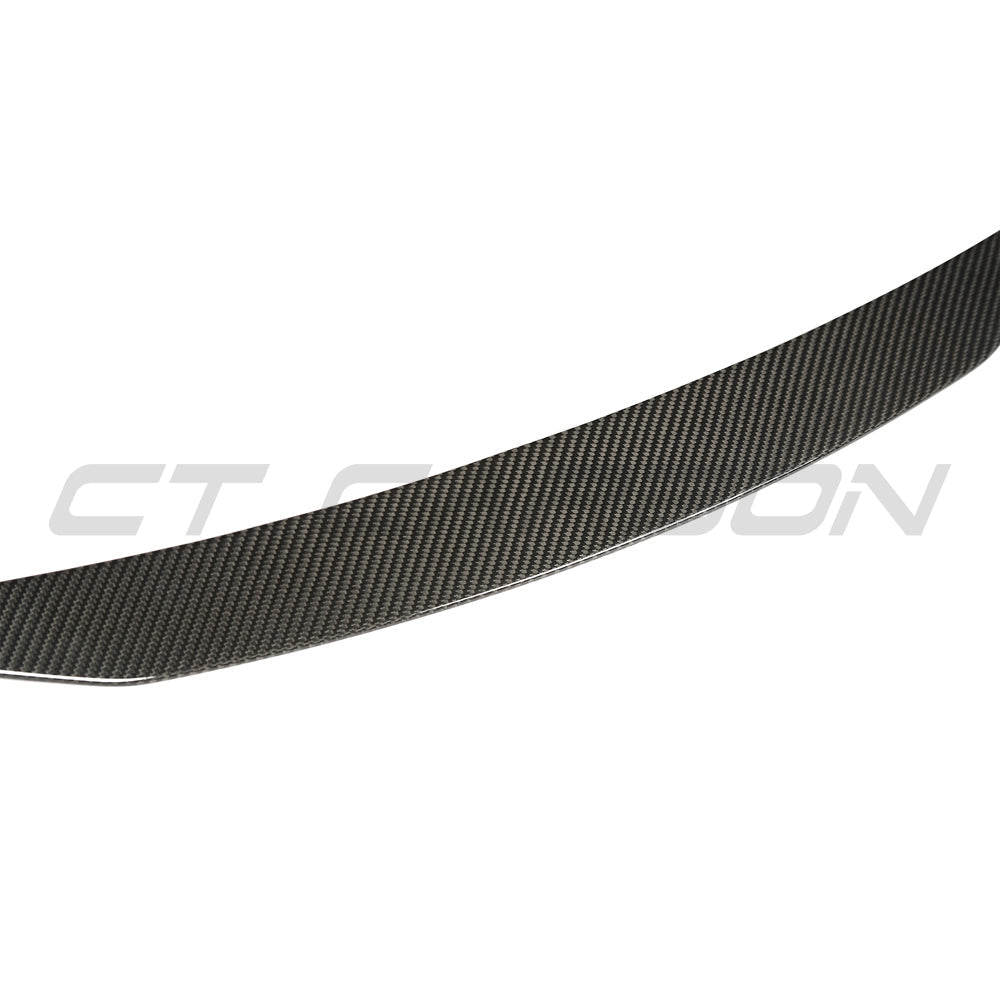 BMW X5/X5M F15/F85 2014-2018 carbon fiber middle spoiler by CT Carbon, shown on vehicle with detailed carbon fiber finish.