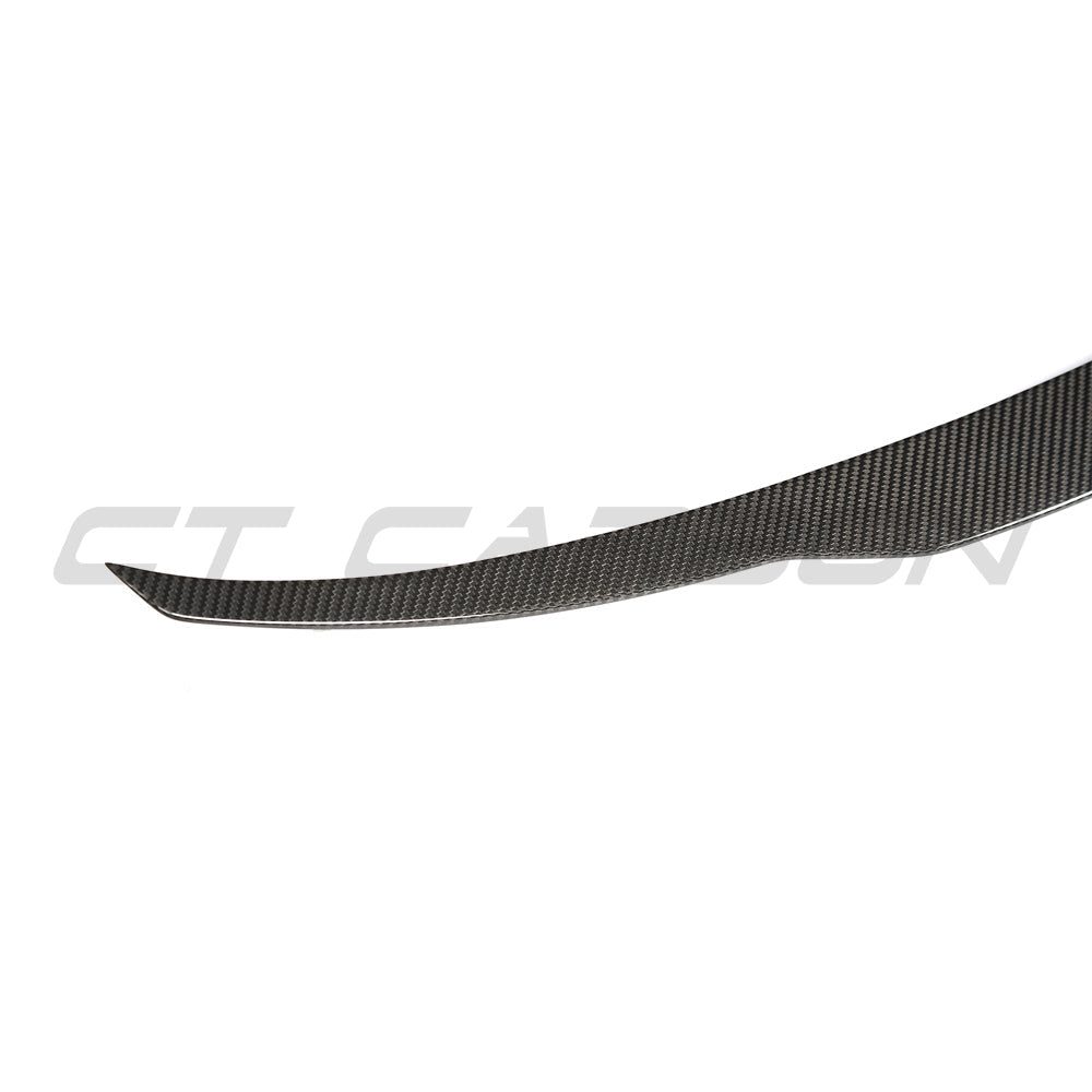 BMW X5 F15/X5M F85 2014-2018 CT Carbon fiber middle spoiler V2 on vehicle, showcasing sleek aerodynamic design.