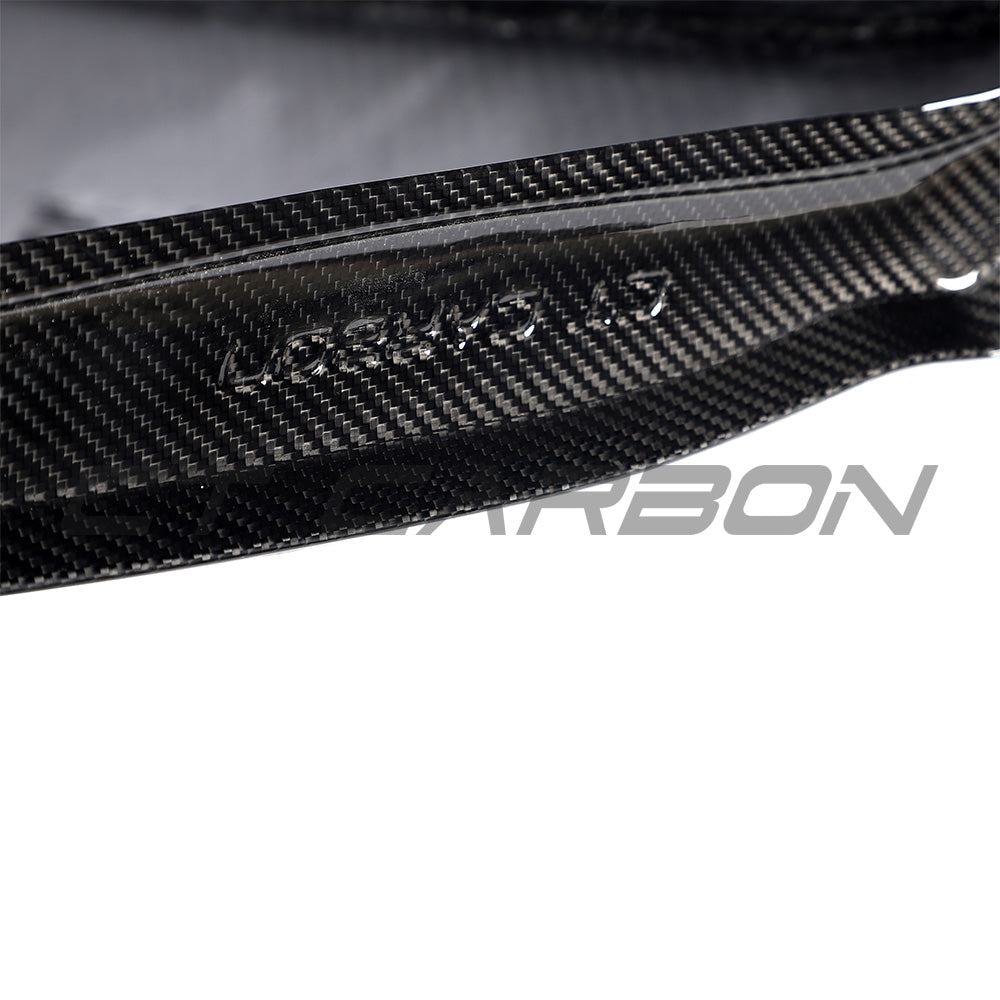 BMW F87 M2 Carbon Fibre Fenders by CT Carbon, showing sleek, lightweight fender design with carbon fibre material and detailed craftsmanship.