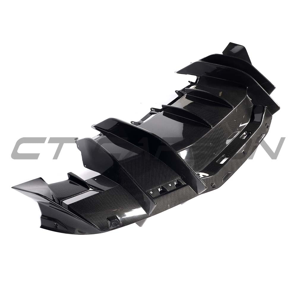 Lamborghini Revueltto carbon fibre rear diffuser by CT Carbon, showcasing sleek aerodynamic design and detailed craftsmanship.
