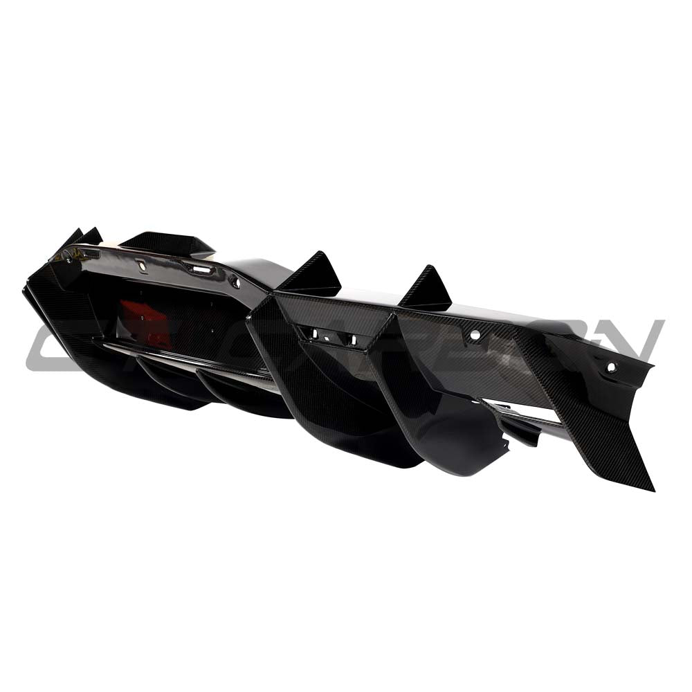 Lamborghini Revuelto carbon fibre rear diffuser by CT Carbon, showcasing sleek aerodynamic design and detailed craftsmanship.
