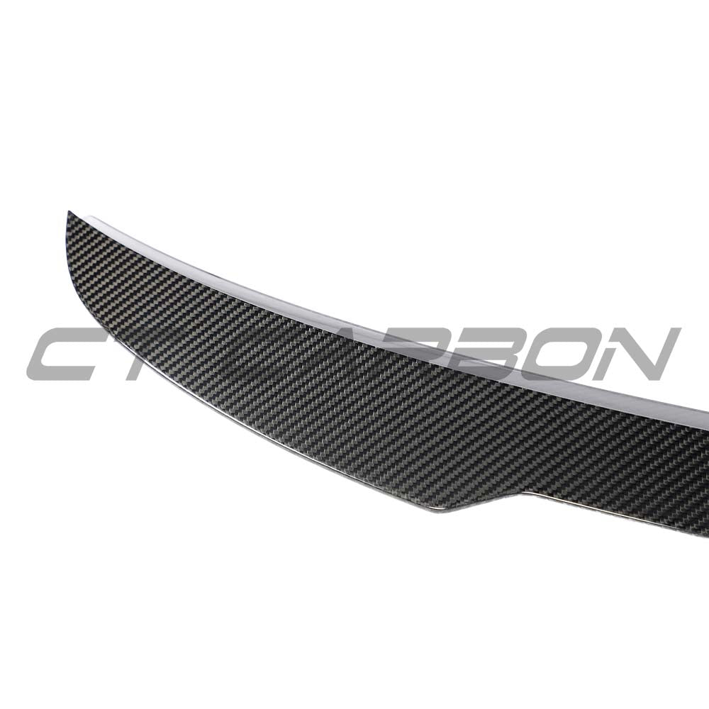 Carbon fiber spoiler for Audi A5/S5/RS5 B9.5 Sportback 2016-2024 by CT Carbon, mounted on rear of vehicle.
