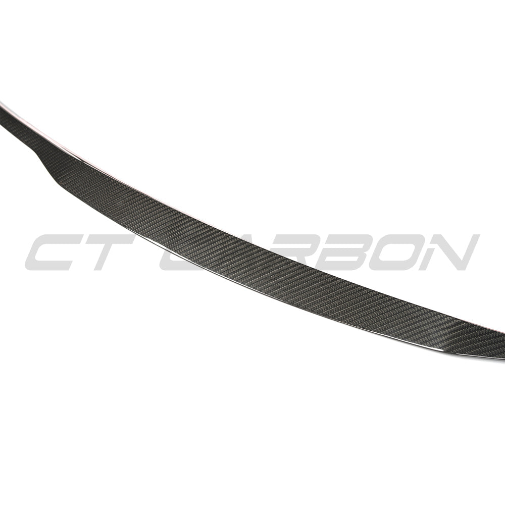 BMW X5/X5M F15/F85 carbon fibre middle spoiler by CT Carbon, showcasing sleek, aerodynamic design for enhanced vehicle performance.