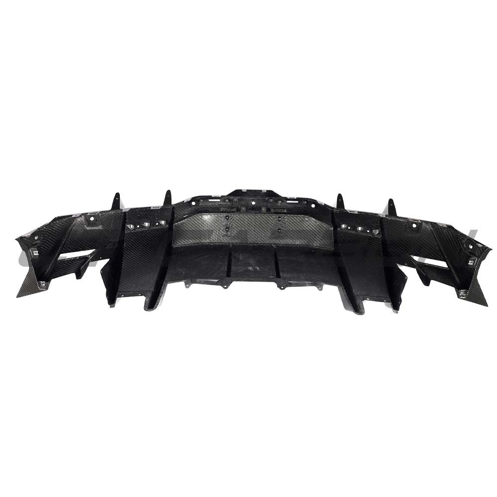 Lamborghini Revueltto carbon fibre rear diffuser by CT Design, showcasing sleek aerodynamic design and textured carbon fiber surface.