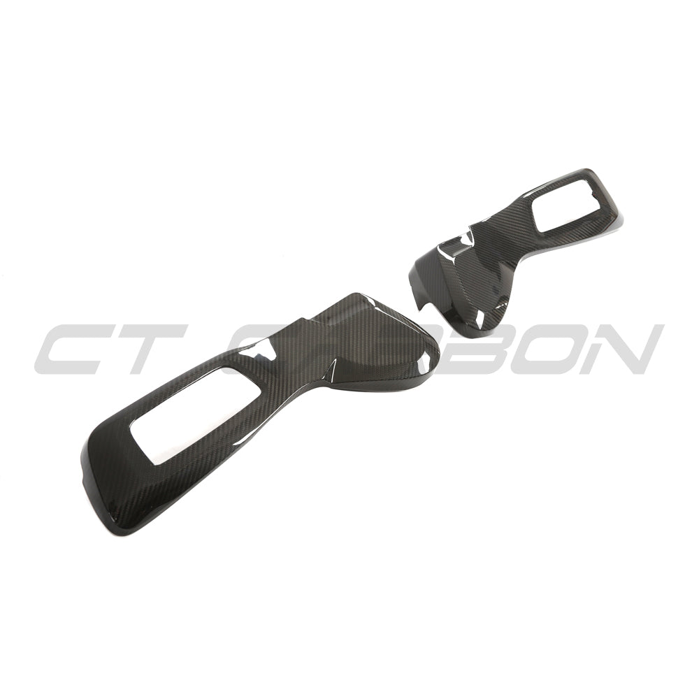 BMW F80 M3 carbon fibre seat control cover by CT Carbon, close-up view of sleek, lightweight accessory for interior enhancement.