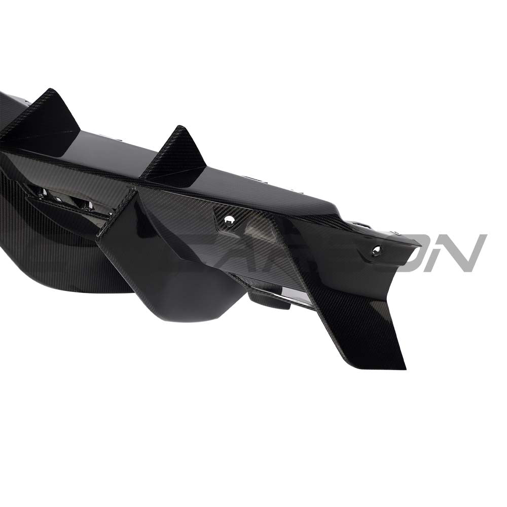 Lamborghini Revuelto carbon fibre rear diffuser by CT Carbon, showcasing sleek aerodynamic design and high-quality materials.