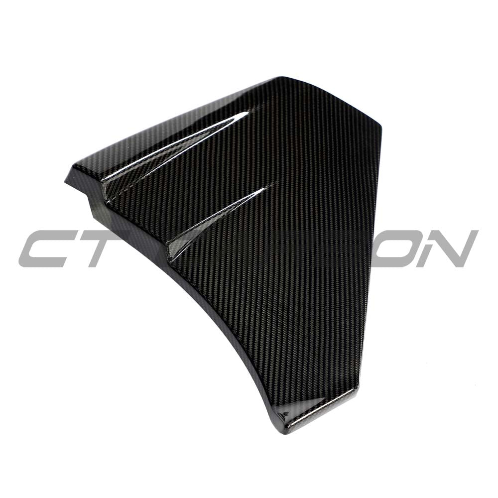 Lamborghini Revueltto carbon fiber door trim side skirts by CT Carbon, showcasing sleek, lightweight design and textured carbon finish.