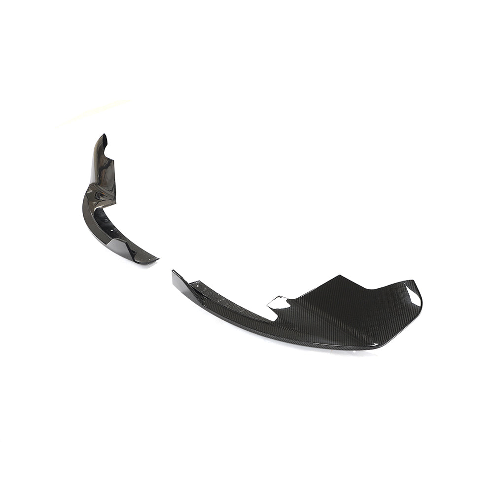 Carbon fiber corner splitters for McLaren 570S and GT, designed by CT Carbon, shown on the car's front corners.