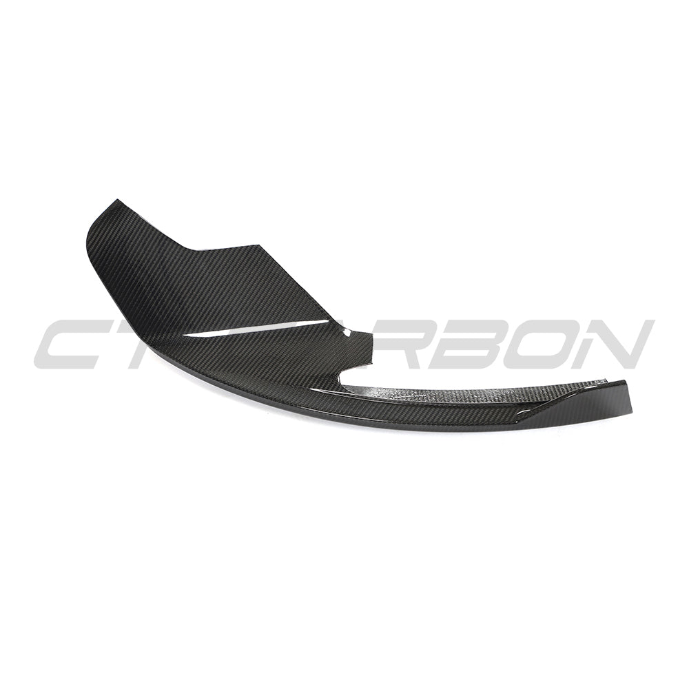 Carbon fibre corner splitters for McLaren 570S and GT by CT Carbon, shown installed on the vehicle's front corners.
