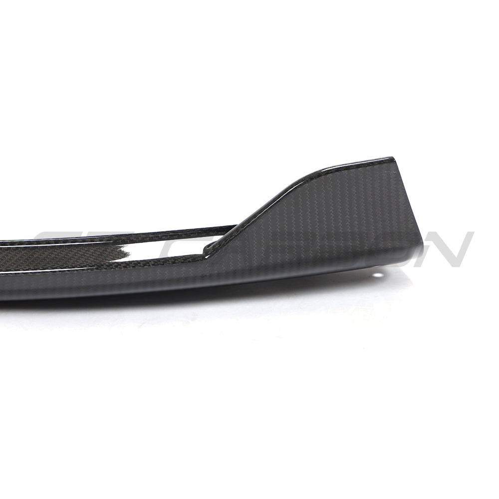 Carbon fibre corner splitters for McLaren 570S and GT, designed by CT Carbon, shown on the car's front corners.