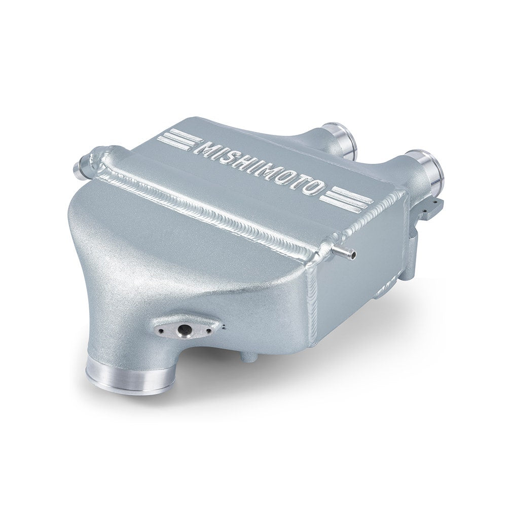 MISHIMOTO performance air-to-water intercooler for BMW F8X M3/M4, color matched, engine part with sleek design and branding.