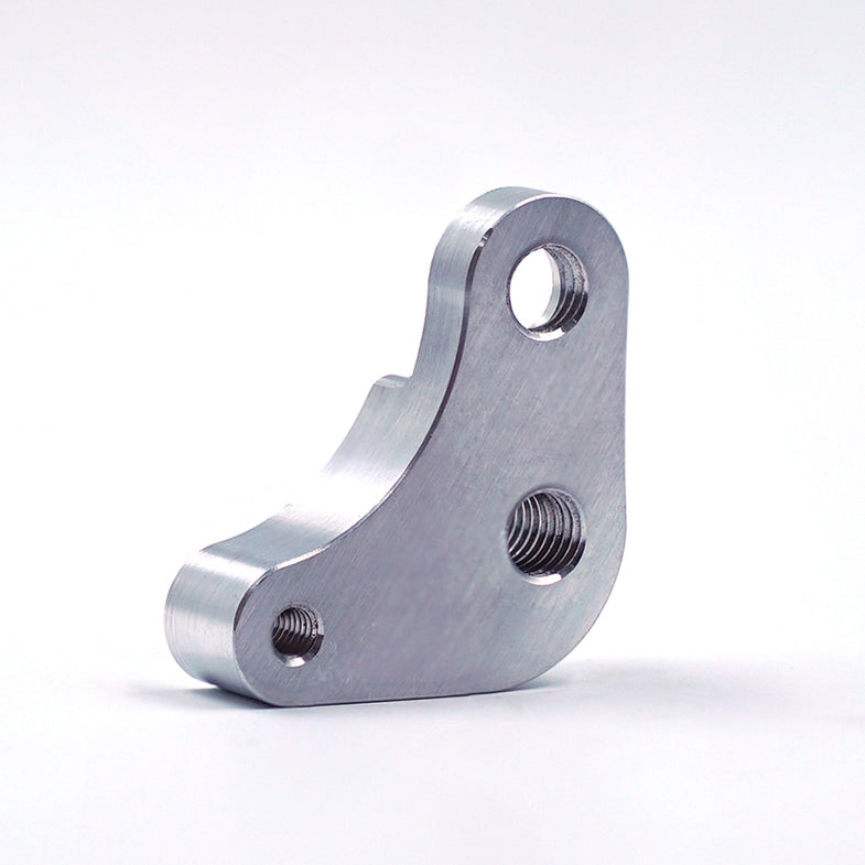 Suspension Secrets Porsche 991 GT3/RS and GT2/RS seat raiser bushes shown from the back, designed for improved seat height and support.