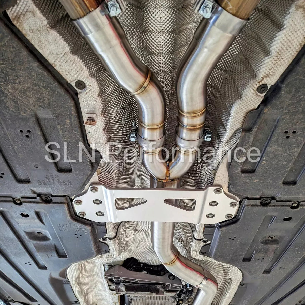 SLN Performance BMW S58 M3 G80 M4 G82 X3M X4M LCI single mid pipe center section with under-brace, stainless steel exhaust component.