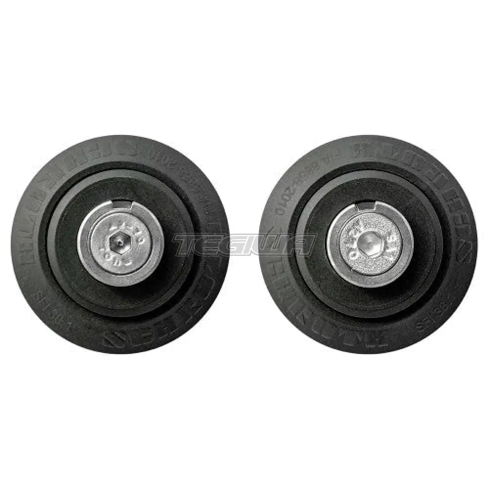 Schroth Twist Anchor FHR Clips for harnesses, metal safety accessories with twist-on design, used in racing and automotive safety.