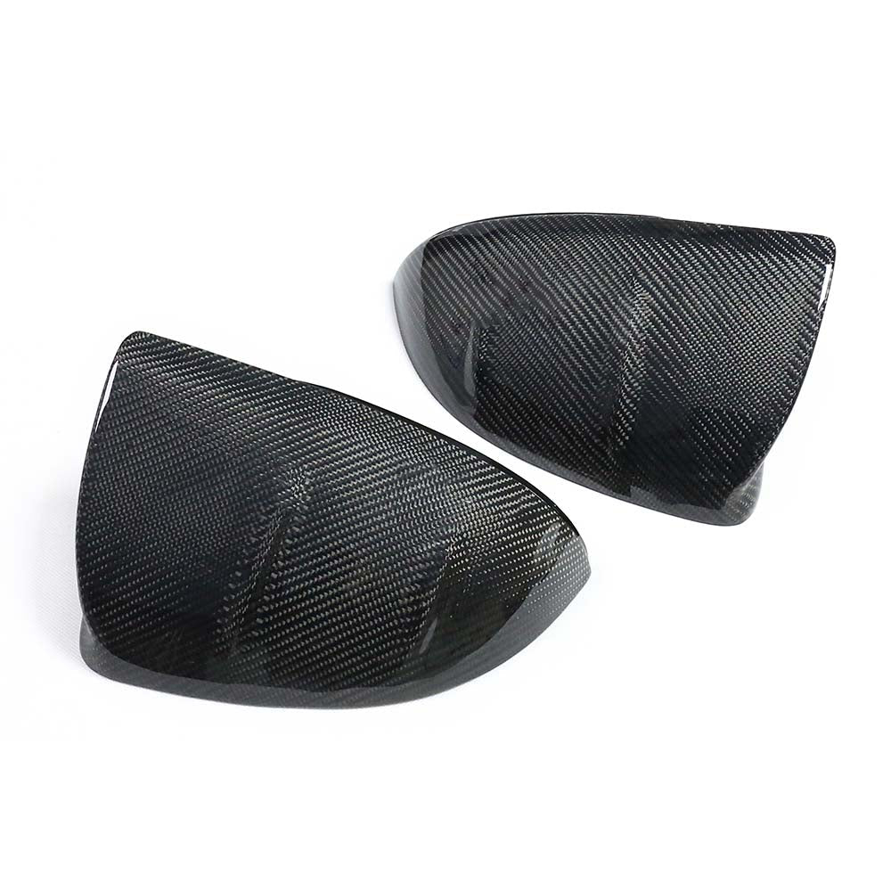 Mercedes C-Class W206 2021-2023 dry carbon fibre mirror cover replacements by CT Carbon, showing sleek, textured mirror housing.
