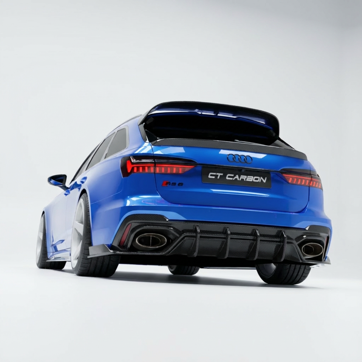 Audi RS6 C8 Avant carbon fibre spoiler by CT Carbon, showing the sleek, aerodynamic design and textured carbon finish.