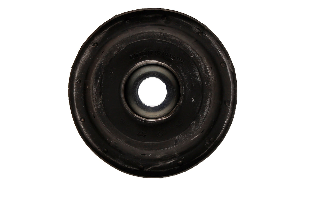 Bilstein B1 front suspension top mount for Volkswagen Golf II, showing the black metal component and mounting hardware.