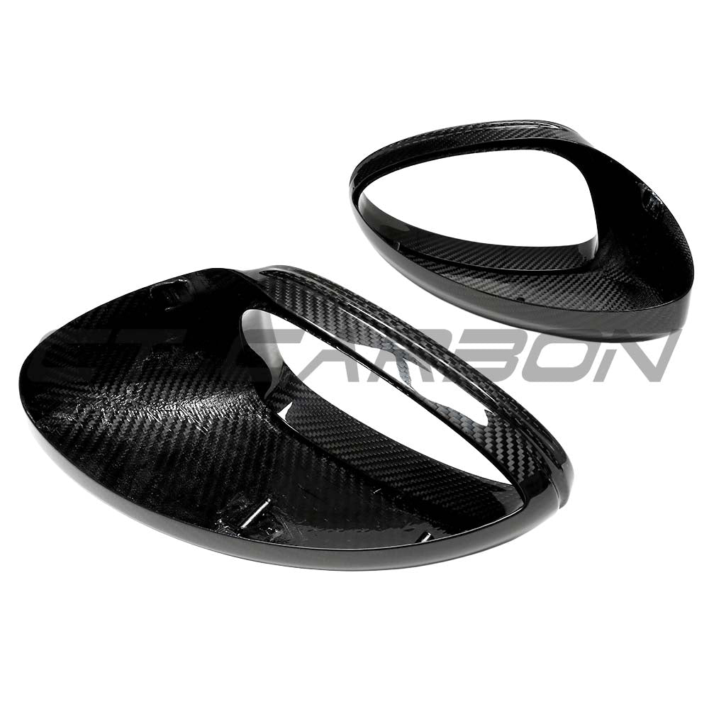 LHD dry carbon fiber mirror covers for Porsche 718 Cayman and Boxster 2019-2021, by CT Carbon, installed on vehicle mirrors.