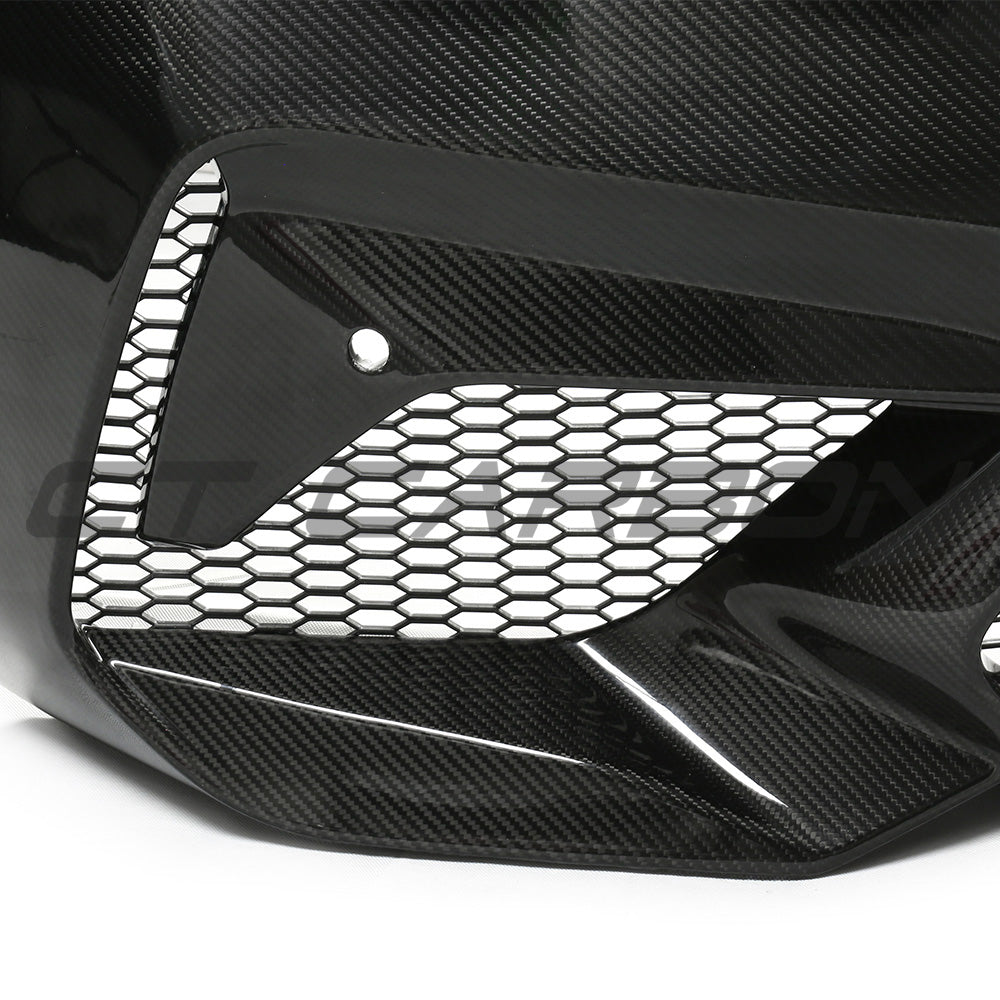 BMW F87 M2C carbon pre-preg fibre front bumper by CT Carbon, showcasing the sleek, lightweight automotive bumper with detailed finish.