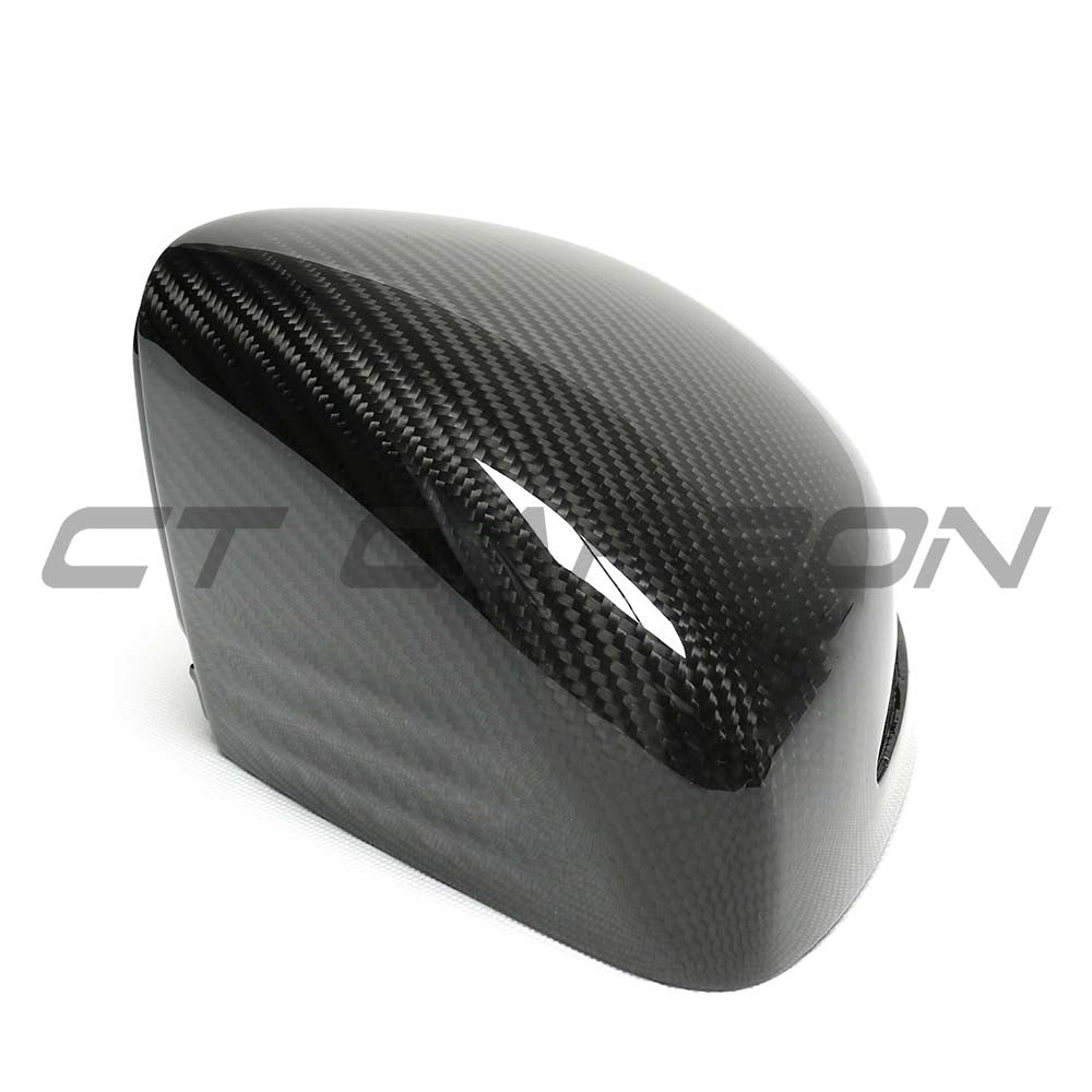 Mercedes G Class W464 2022+ dry carbon fiber mirror covers by CT Carbon, showcasing sleek, textured mirror replacement parts.