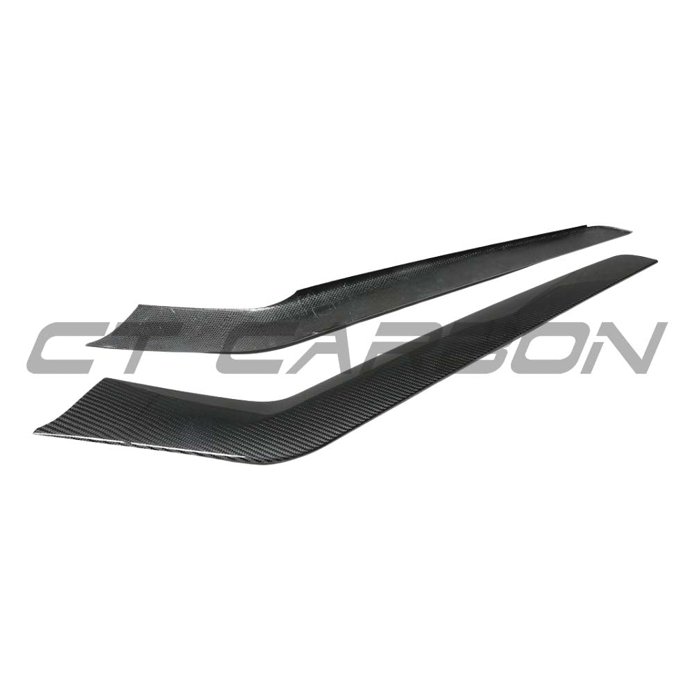 Tesla Model Y 2025+ facelift dry carbon center console side panel by CT Carbon, showcasing sleek carbon fiber finish and precise fit.