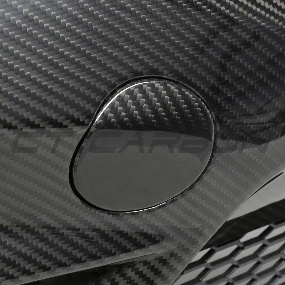 BMW F87 M2 carbon fibre bumper replacement kit by CT Carbon, showing sleek, lightweight carbon fibre bumper components on a white background.