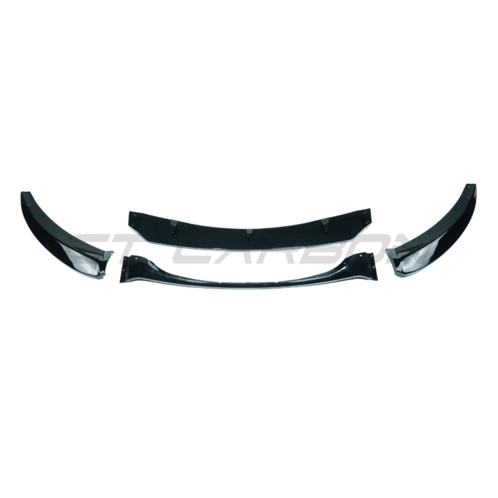 BMW E82/E88 1 Series 2007-2013 LCI CT Carbon gloss black splitter installed on front bumper, enhancing sporty look.