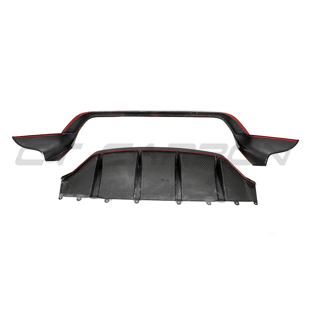Carbon fiber diffuser for Porsche Taycan 2020-2024 by CT Carbon, shown with sleek, textured carbon fiber material.