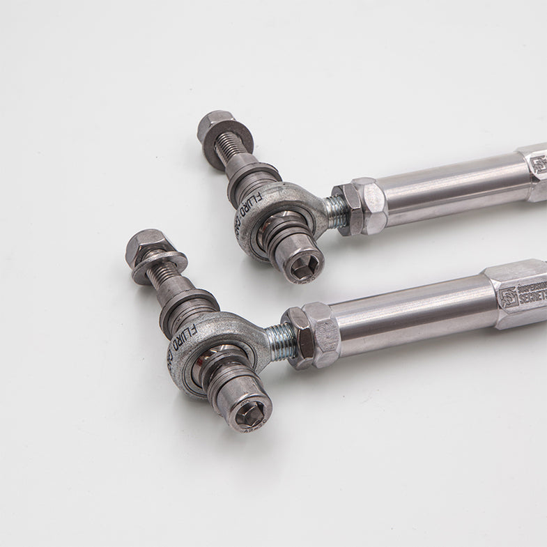 Suspension Secrets adjustable bump steer tie rod ends for Porsche 911 GT3 (992) showing close-up of suspension linkage components.