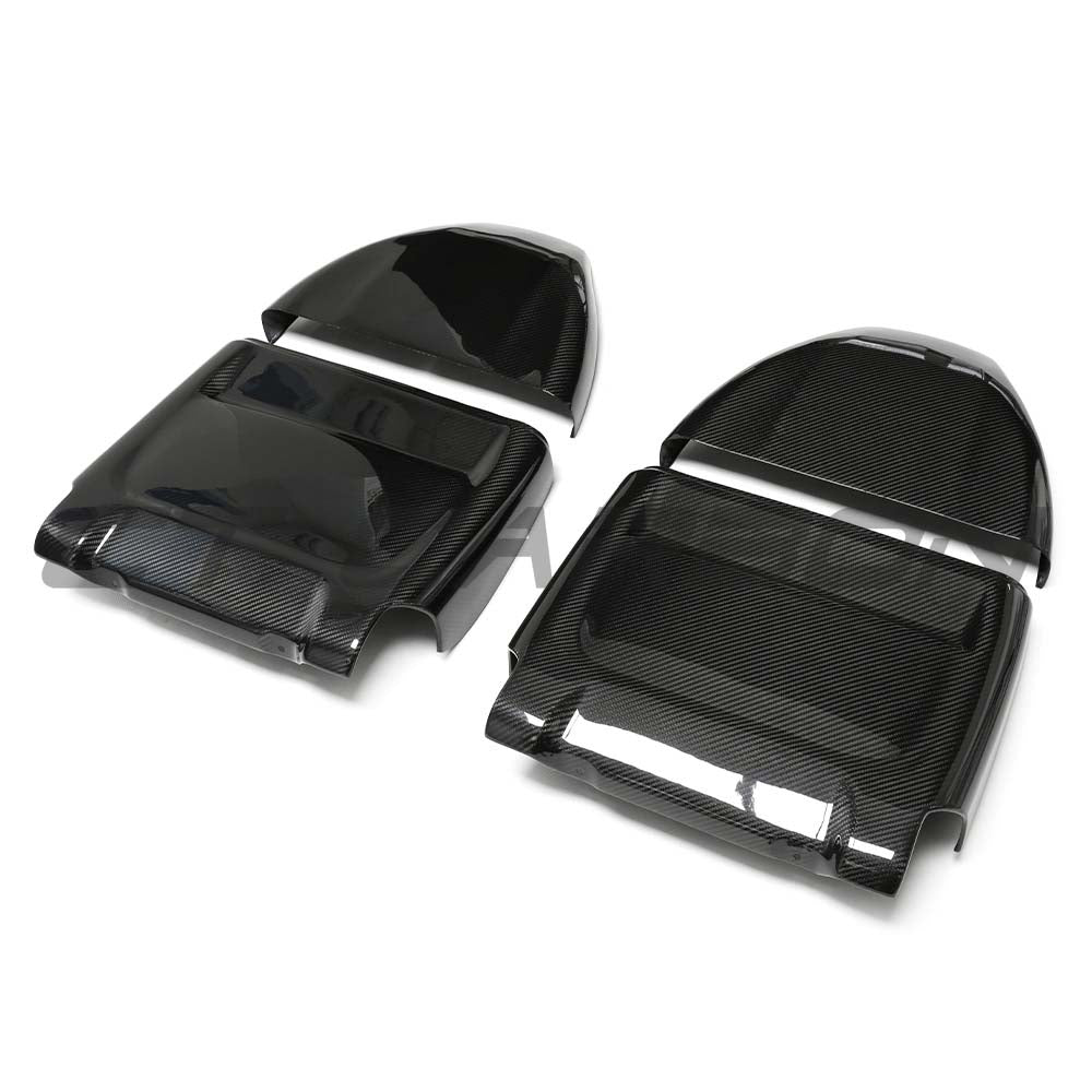 BMW M5 F90 dry carbon seat backs accessory by CT Carbon, showing sleek carbon fiber material and detailed craftsmanship.