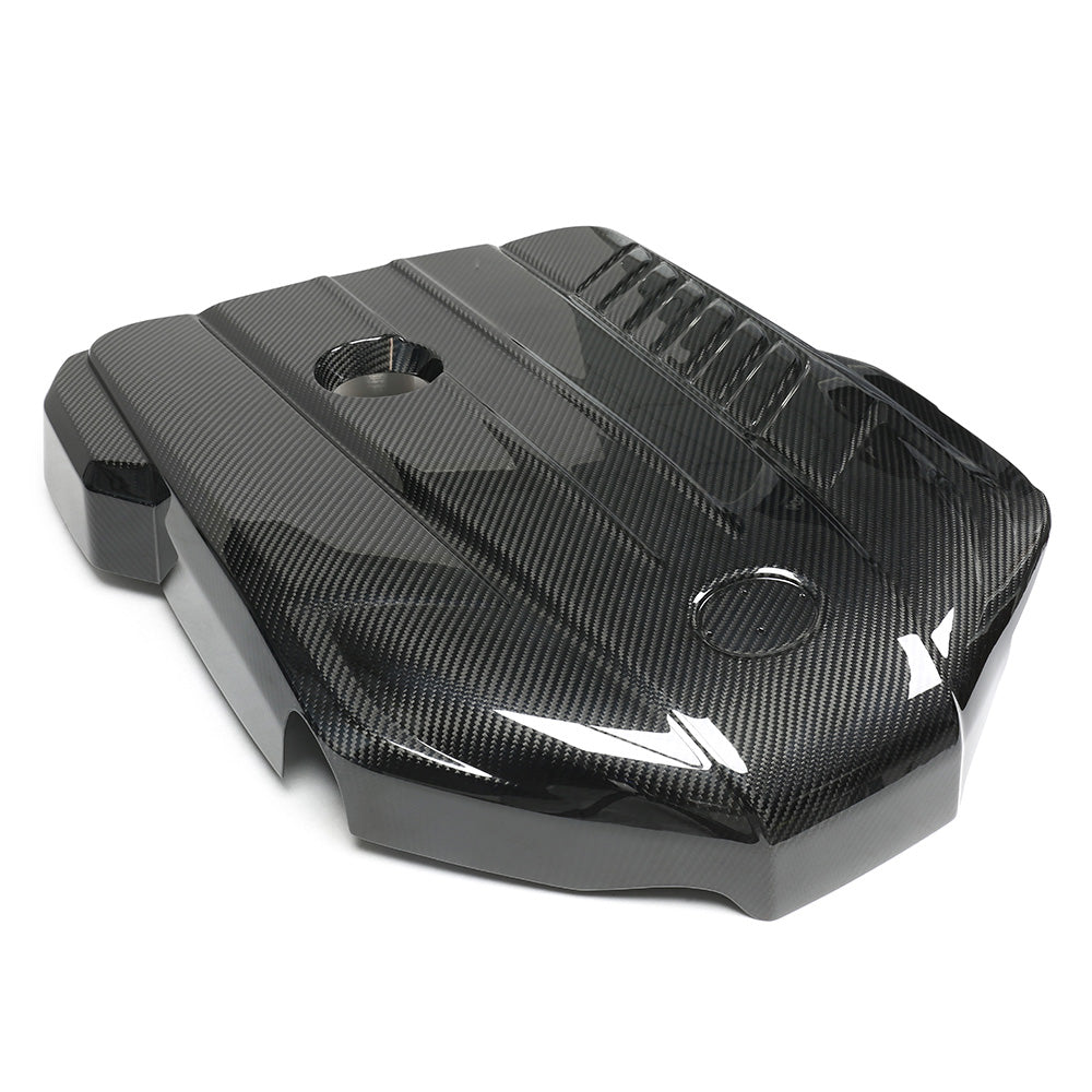 CT Carbon Toyota Supra A90 3.0T B58 carbon fiber engine cover installed on the engine bay, showcasing sleek black design and lightweight material.